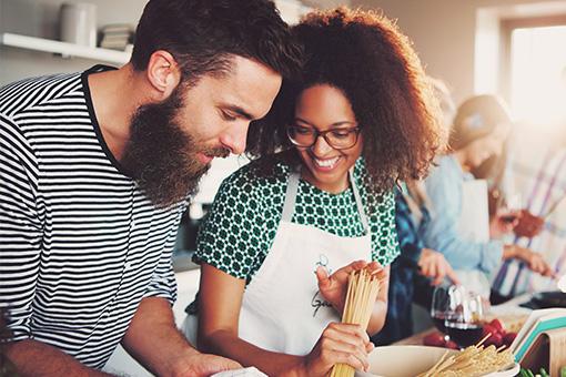 A couple cooking a healthy meal together