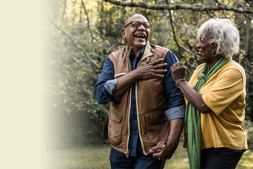 Couple laughing because their chronic disease self-management program is working.
