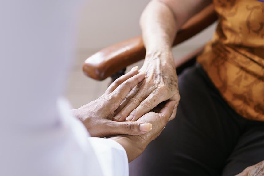 Doctor comforting a patient.