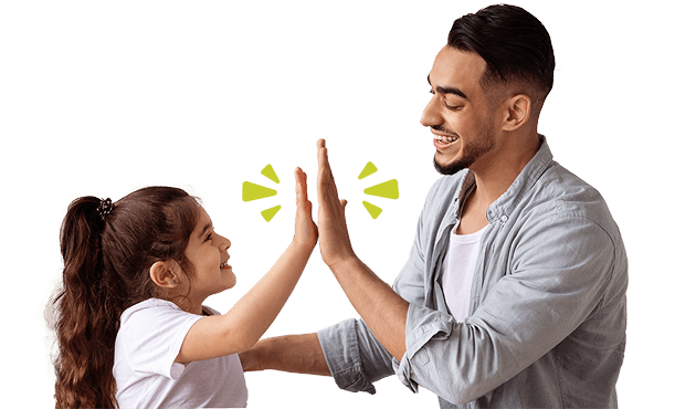 A parent and child high-fiving