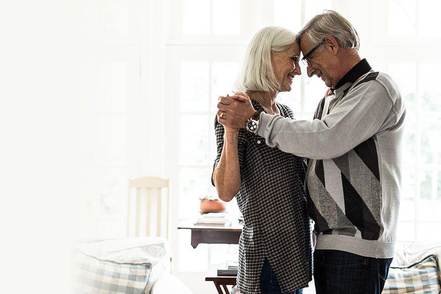 Couple dancing free of pain because of their chronic pain self-management program.