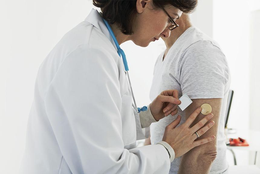 Doctor helping a patient with tobacco cessation.