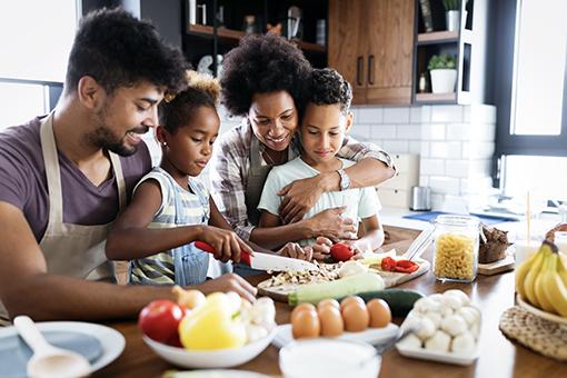 Family preparing a healthy meal together.