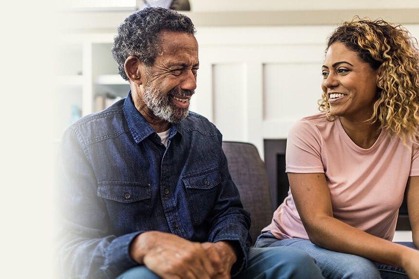 A father discussing his self-management program with his daughter.