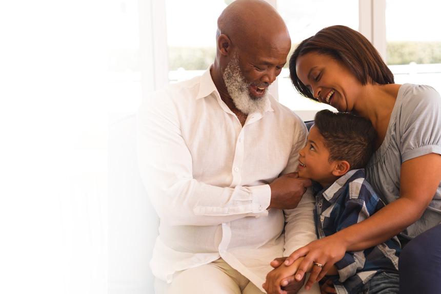 Man with high blood pressure holding his daughter and grandson