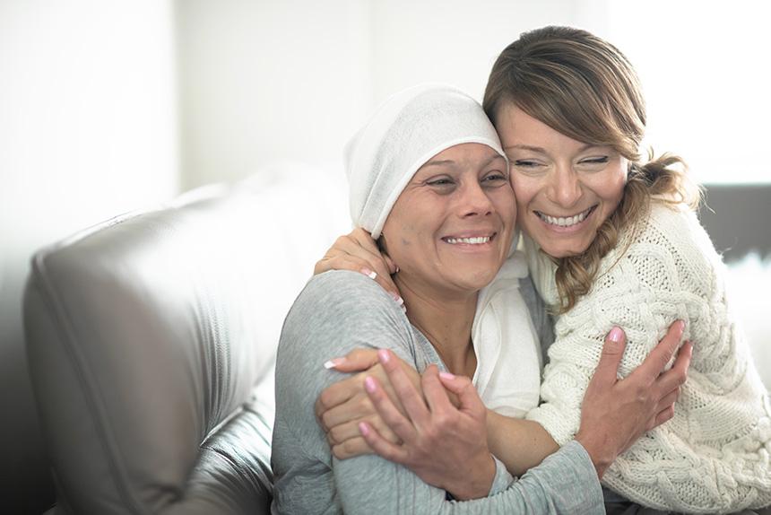 Cancer survivor and her daughter hugging