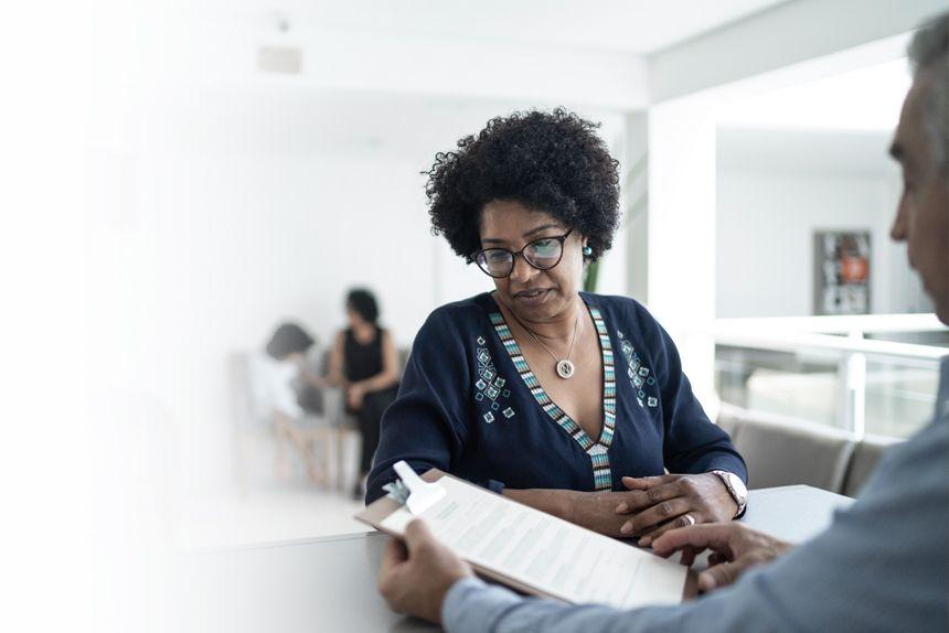 Woman learning about her options for insurance and assistance to help with her diabetes